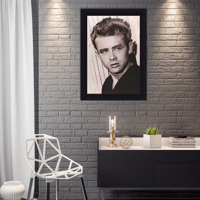 Movie poster in a thick wooden frame