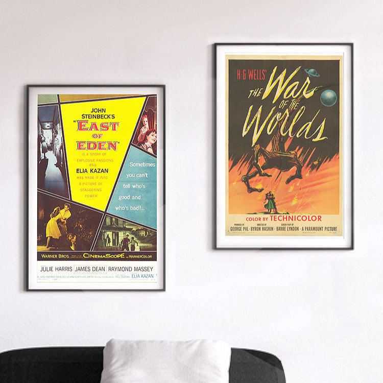 Original movie posters hung on a living room wall